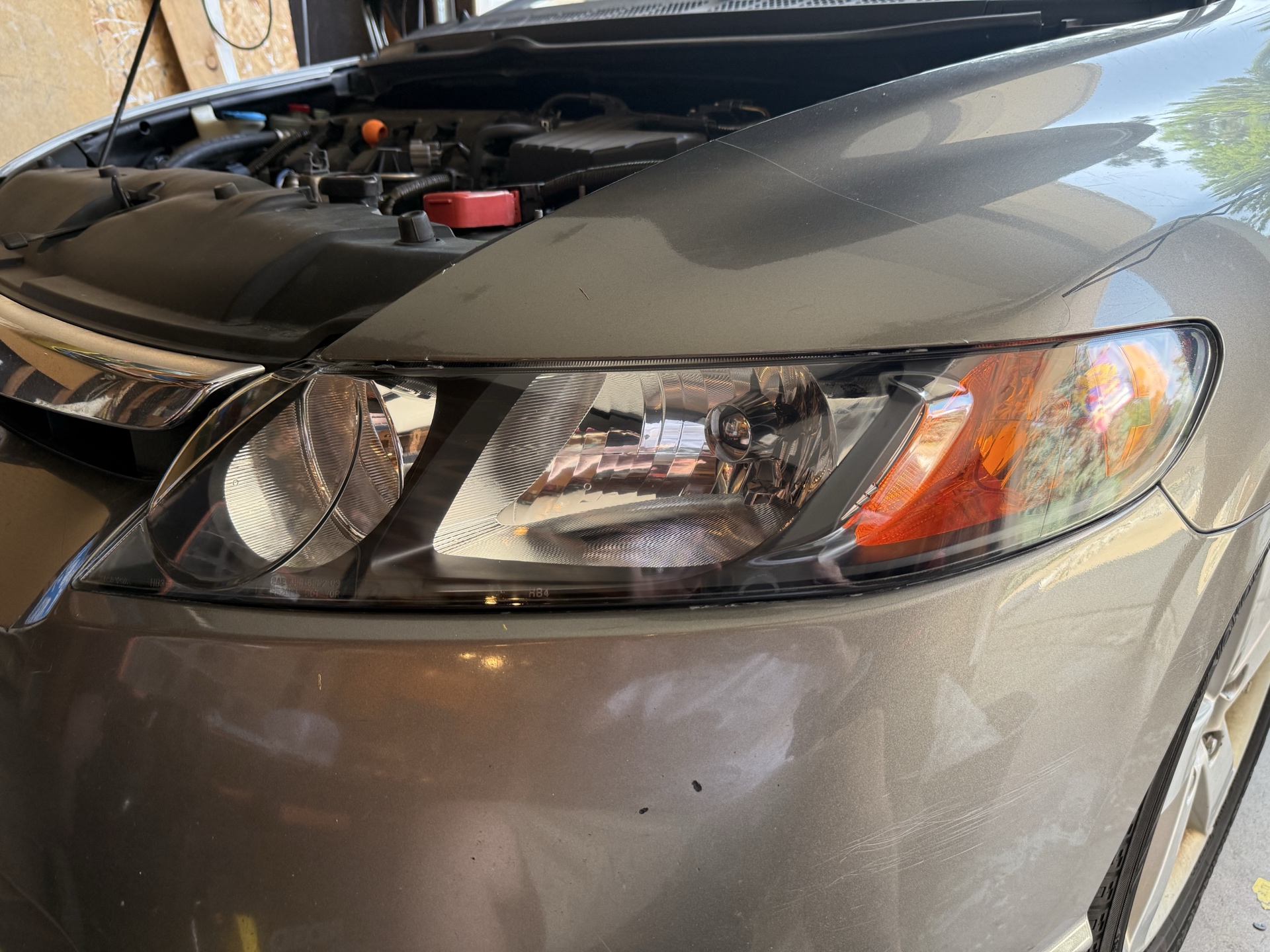 Honda Civic after headlight restoration — clear, like-new headlights