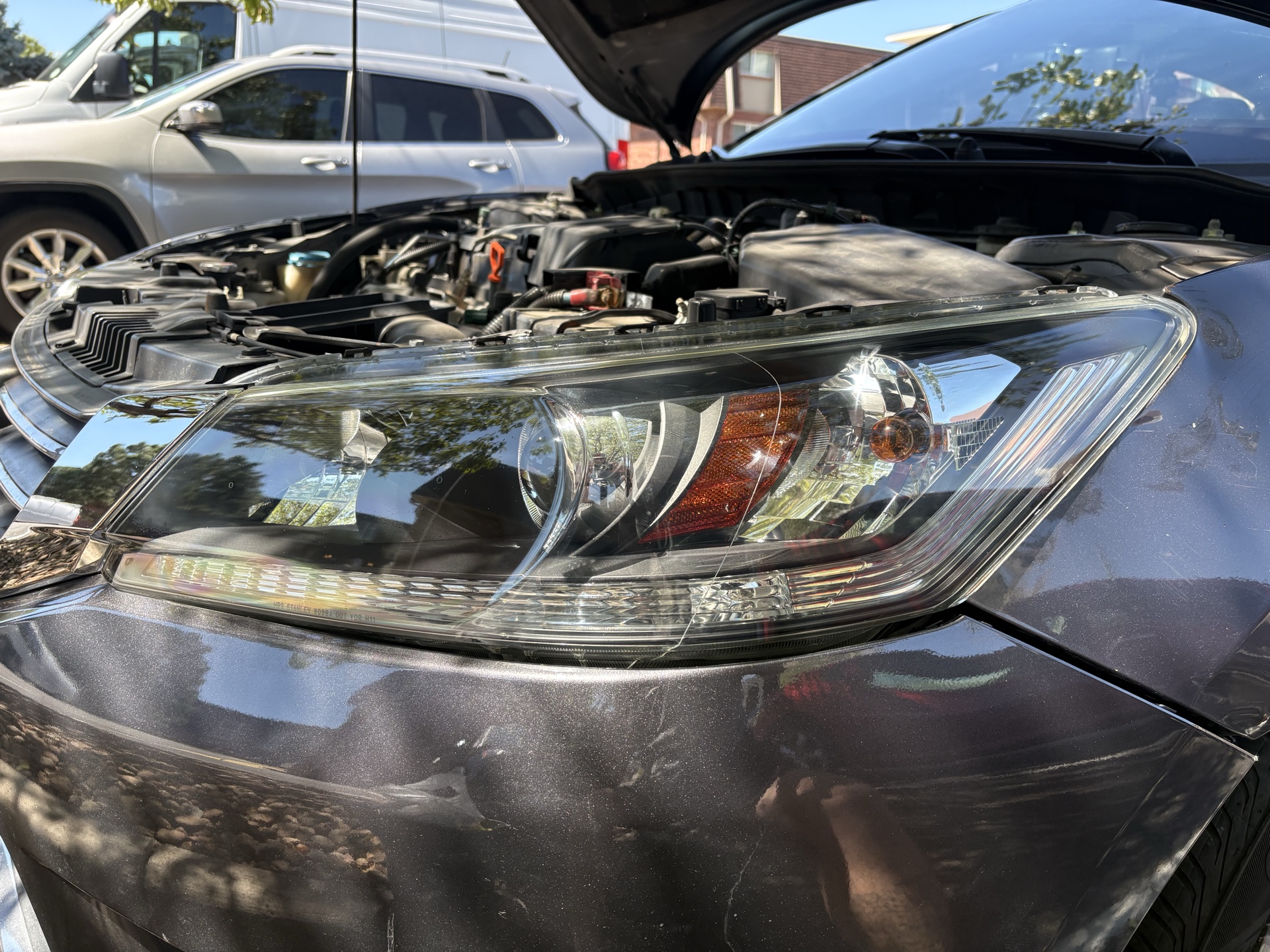 2015 Honda Accord headlight after restoration showing a clear exterior lens