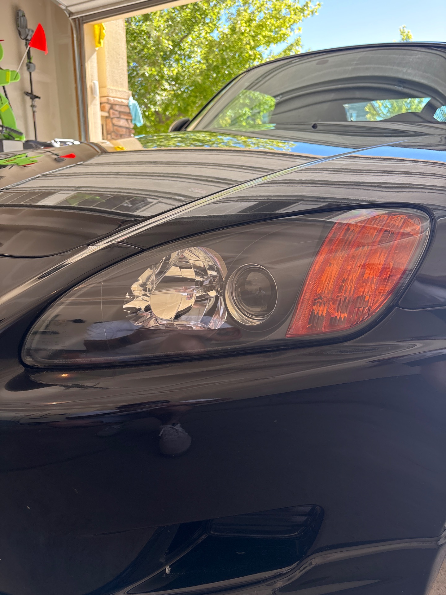 2002 Honda S2000 after headlight restoration — clear, like-new headlights