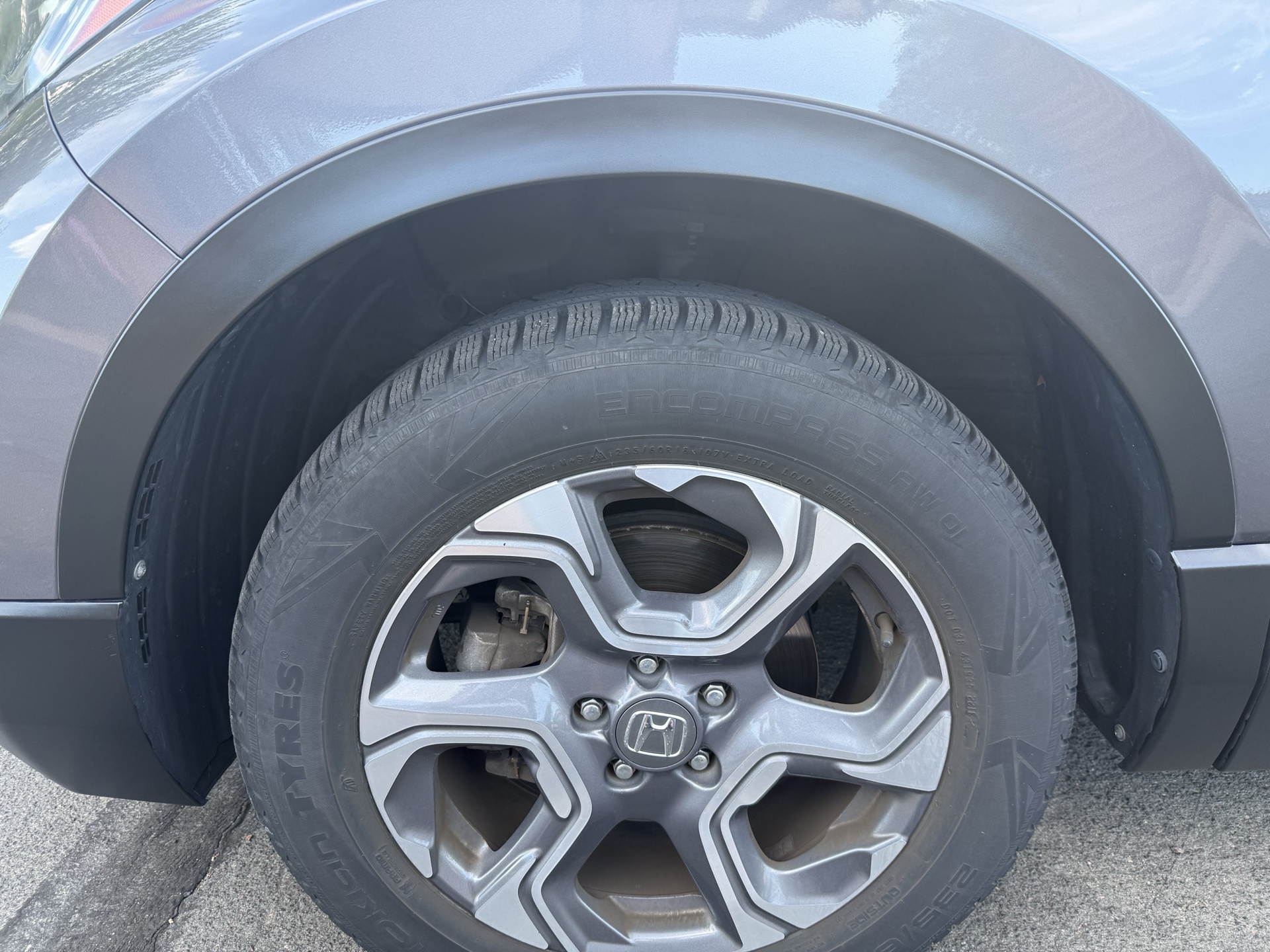 Restored wheel-arch trim after service
